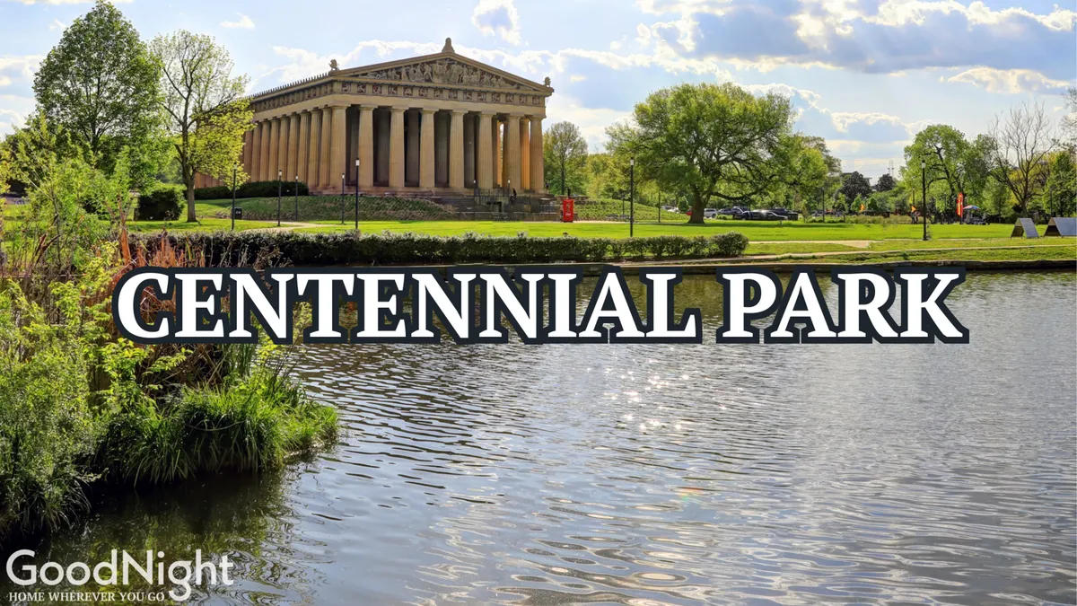This image showcases the iconic Parthenon-like structure in Centennial Park, surrounded by serene water and lush green spaces. The tranquil mood and inviting setting embody a perfect spot for group picnics, family walks, or outdoor relaxation.